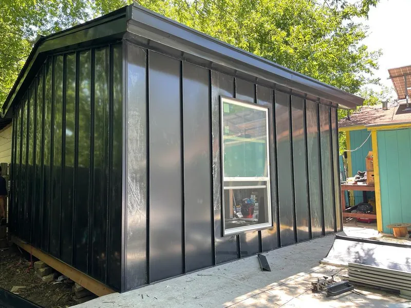 Black standing seam metal wall panels for Roof Inspection in Florence-Graham